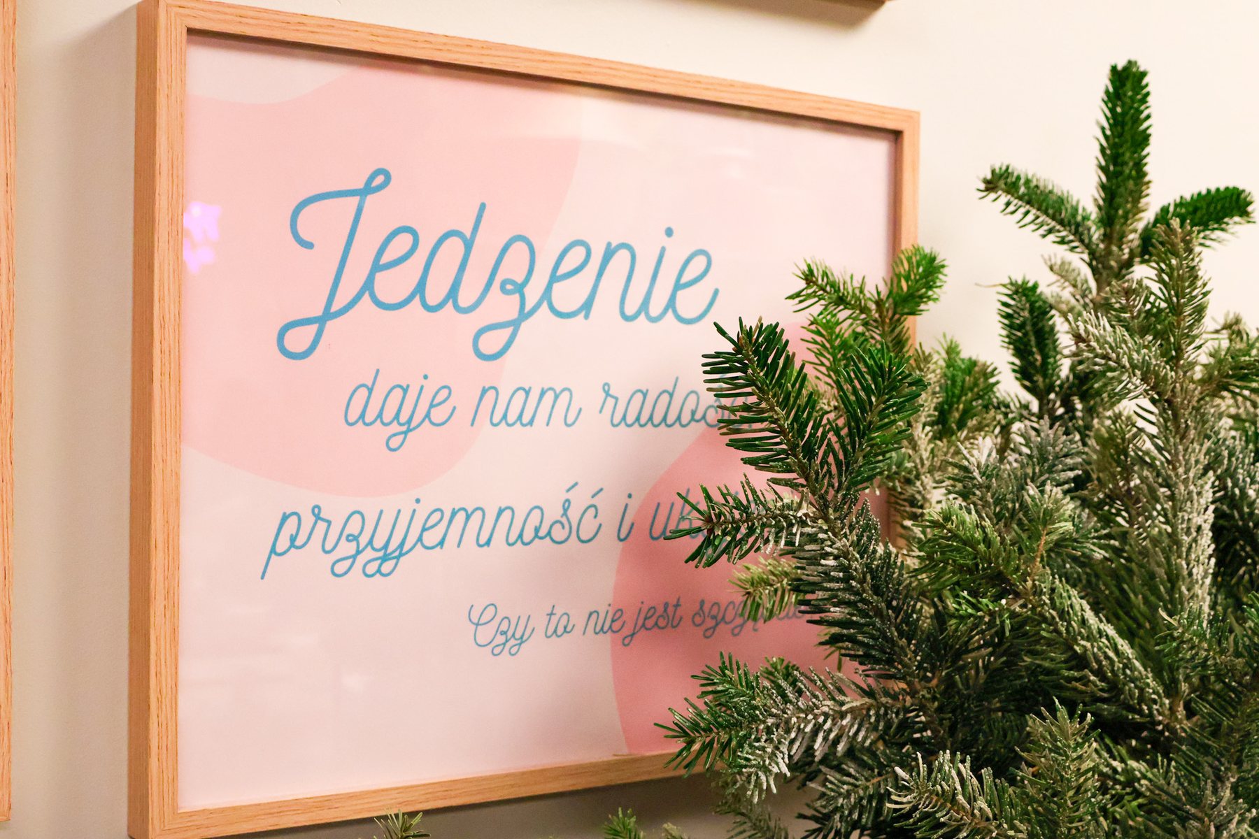 Pink wall art about food and joy